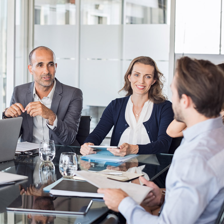 Insurance brokers engaging in a meeting