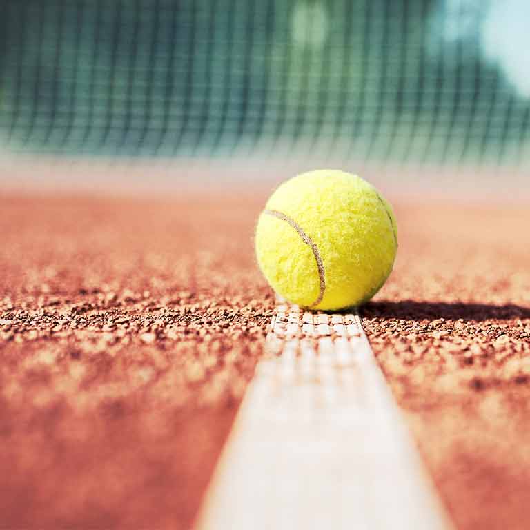 Tennis ball clay court